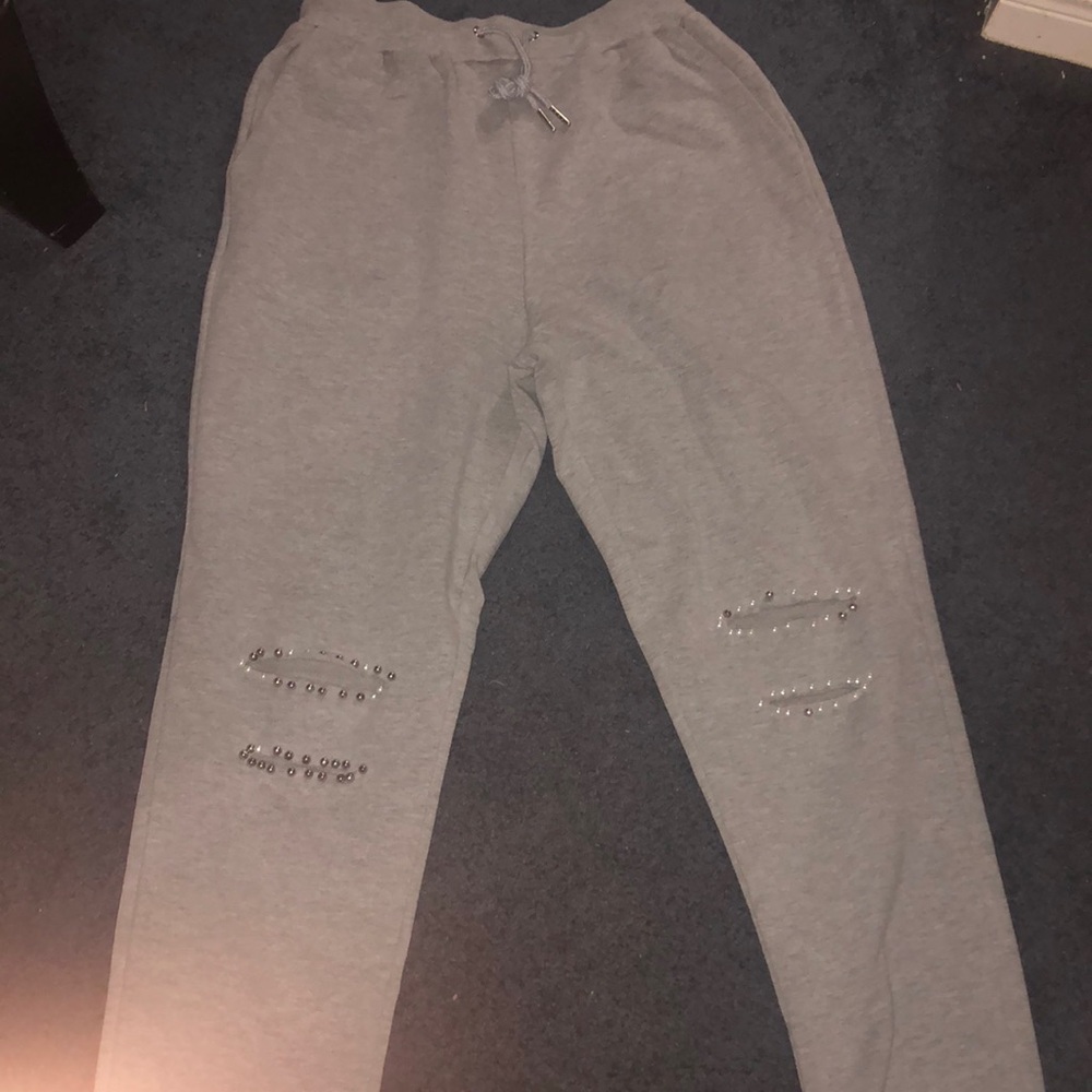 Posh joggers with pearls and chrome, knee slit